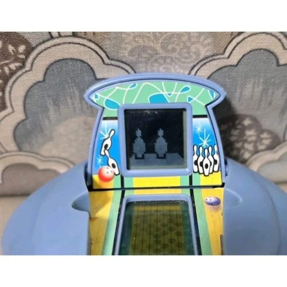 WORKING Radica King Pin Bowling Handheld Electronic Travel Game Roller Ball 2001